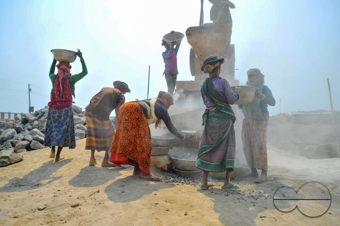 Male and female workers are breaking LC stones with a crusher machine in Bholaganj area, known as the 'Stone State' of Sylhet Companyganj Upazila