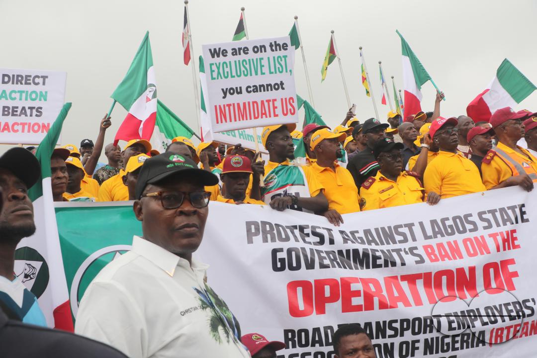 Members of  the Trade Union Congress (TUC) and the Road Transport Employers Association of Nigeria, RTEAN gather to protest against the ban on RTEAN operations by the Lagos state government in Ikeja, Lagos, Nigeria.