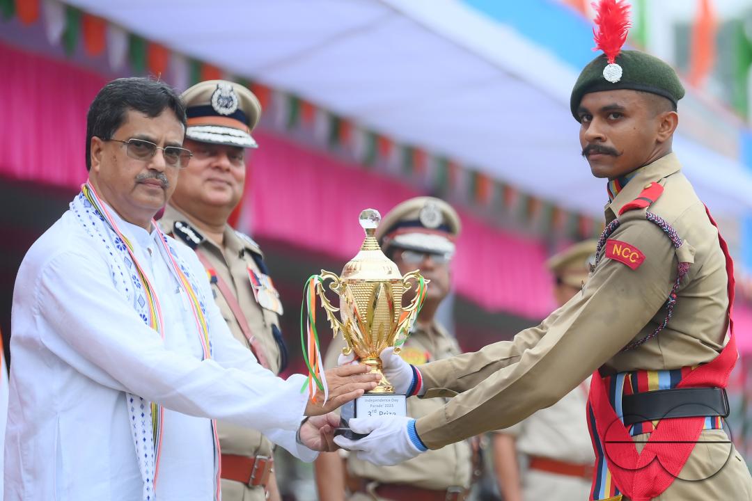 Tripura Chief Minister Manik Saha distributes awards and medals to the soldiers of different platoons during the 77th Independence Day function at the Assam Rifles ground in Agartala