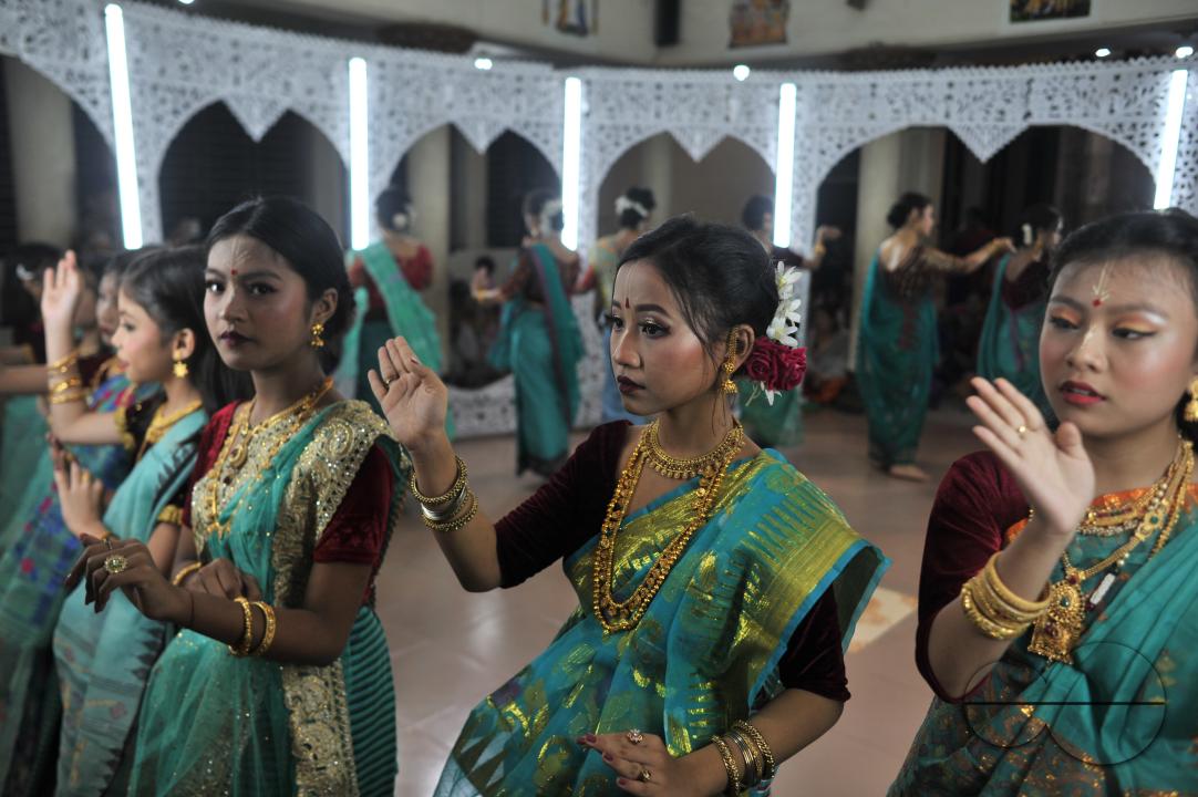 The manipuri community dancing with their traditional dresses