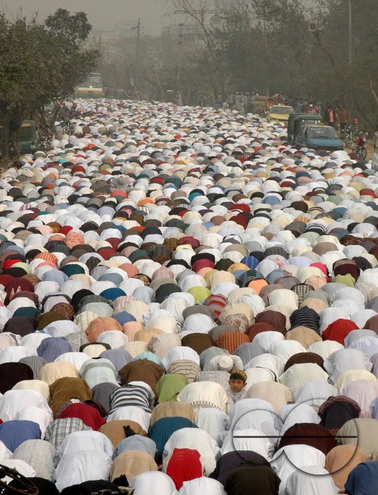 Pilgrims flow into the bank of Turag
