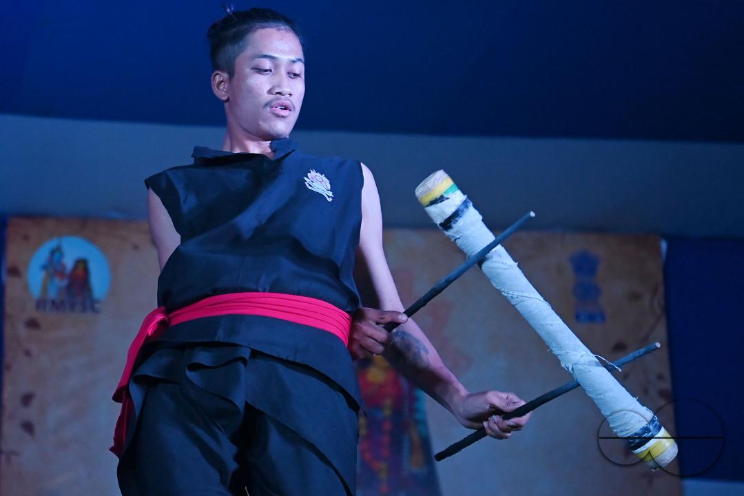 Manipuri martial arts students performing at the opening program of the 225th Raas Festival in Radha madhab Mandir at Agartala