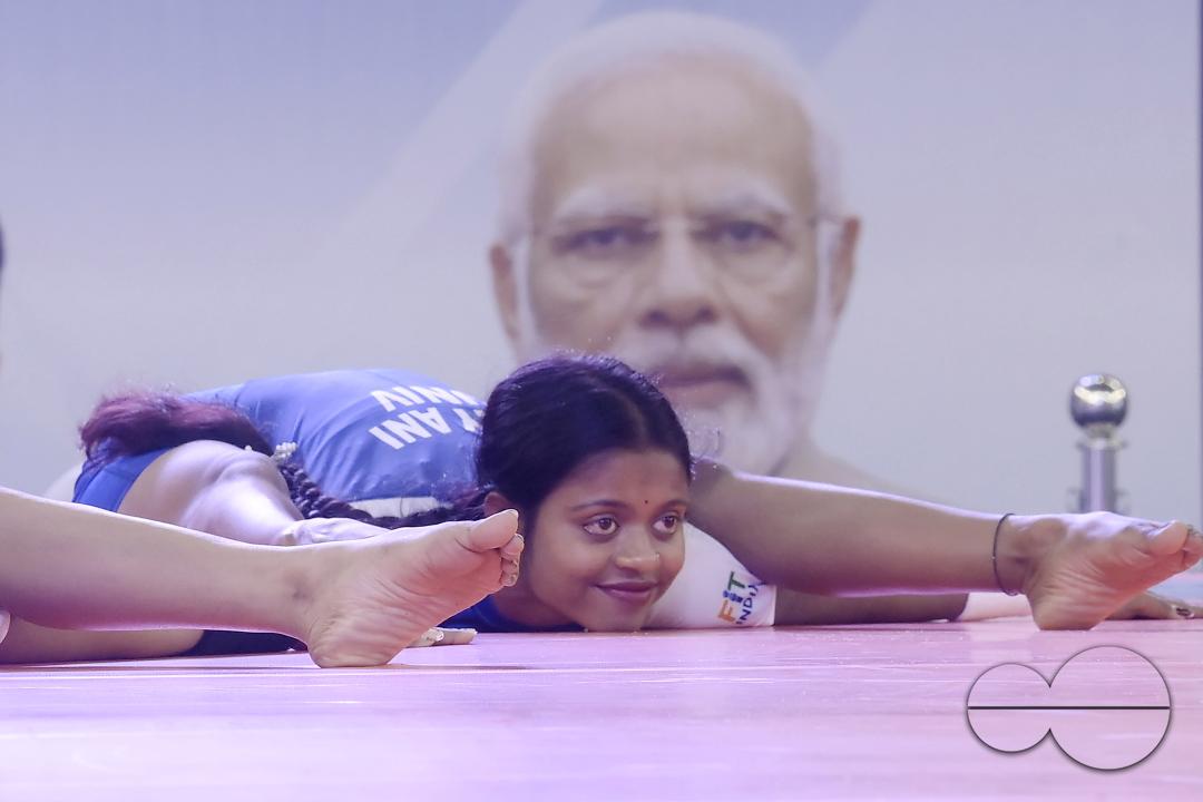 Students of Kalyani University in Orissa perform Yoga at the Khelo India University Games competition