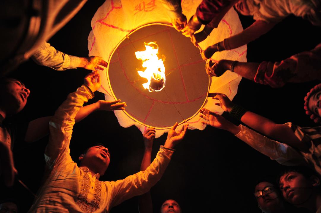 Buddhists religious followers are lighting fire sparks to celebrate Prabarana Purnima 2023 at Buddhist temples in Sylhet