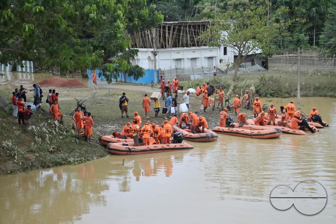 NDRF (National Disaster Response Force) personnel are seen preparing themselves to rescue people from a flooded village in the outskirts of Amarpur city, 82km away from Agartala