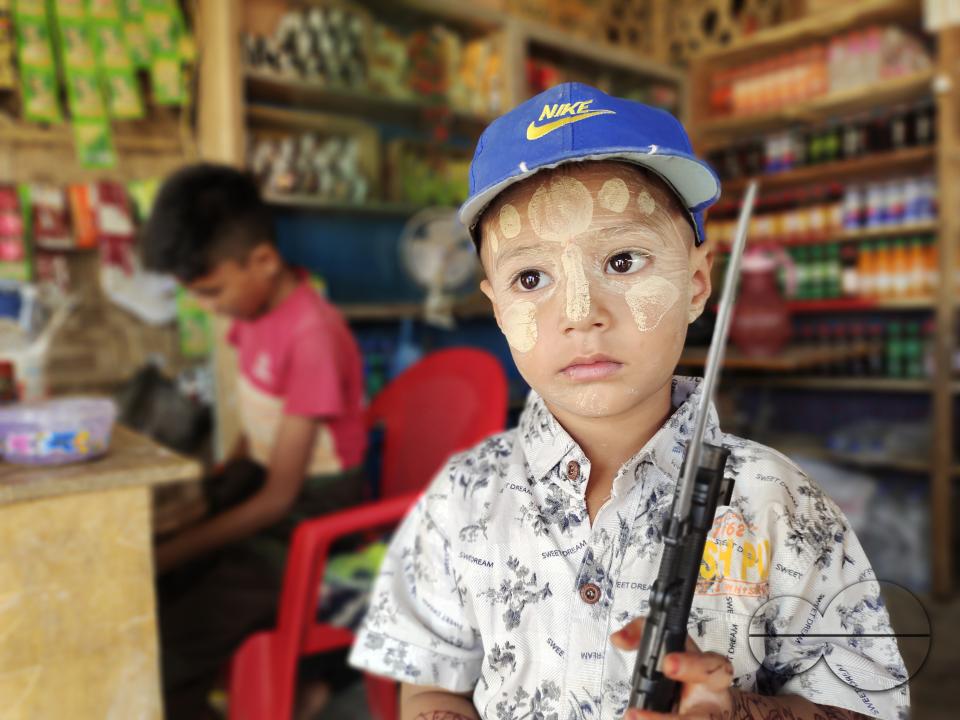Portrait of a child dressed for a concert at the Balukhali refugee camp