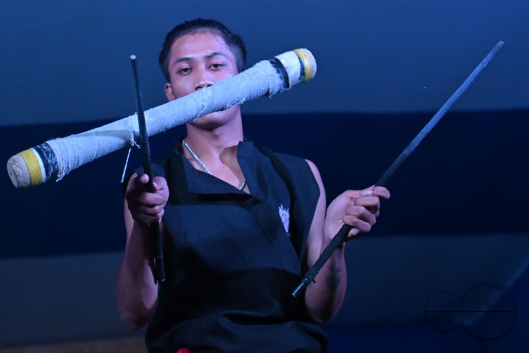 Manipuri martial arts students performing at the opening program of the 225th Raas Festival in Radha madhab Mandir at Agartala