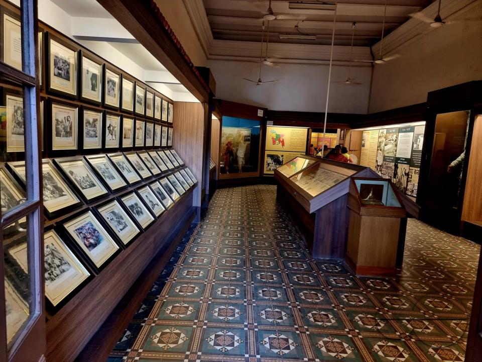 The inside of the Liberation War Gallery in the State Museum of Tripura,  is dimly lit by the exhibits of the war of liberation of Bangladesh in 1971