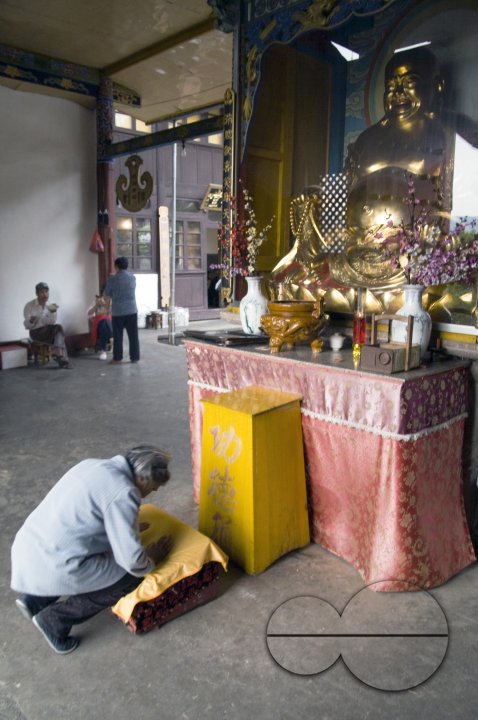 CHINA Elderly people worshipping at a temple in a village in Yunnan province.