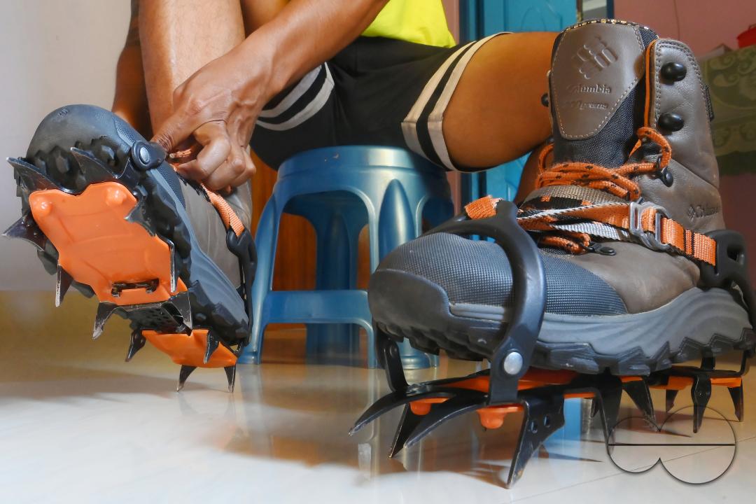 Aritra Roy, an IT professional and mountaineer, adjusting the spikes on his shoe after climbing the highest mountain in Europe, Mount Elbrus