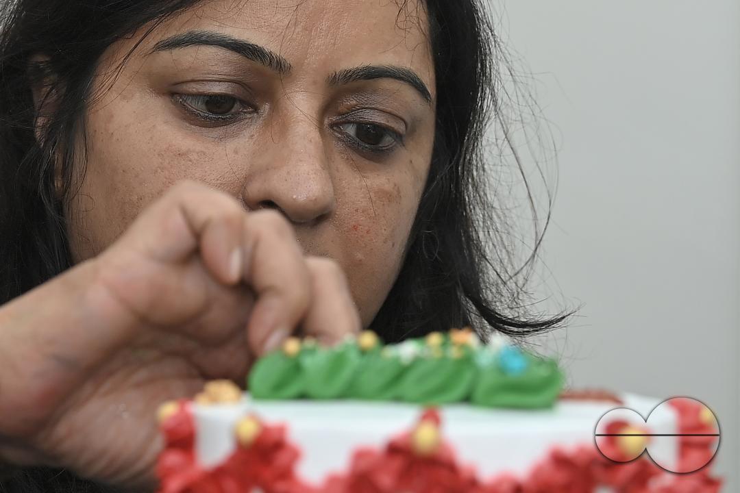 Sutapa Choudhary, a cake artist and teacher, making cakes at her cake parlour, "CREAMY DELIGHTS"