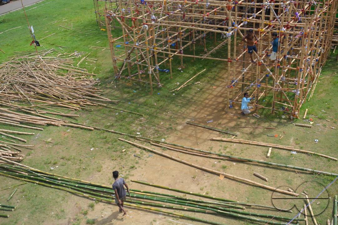 Workers are making a temporary bamboo structure, locally called "Pandal", for the upcoming Durga Puja in Agartala
