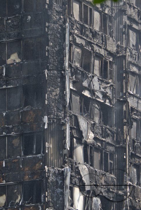 Fire brigade and community groups helping with fire disaster at  of Grenfell Tower in West London,UK