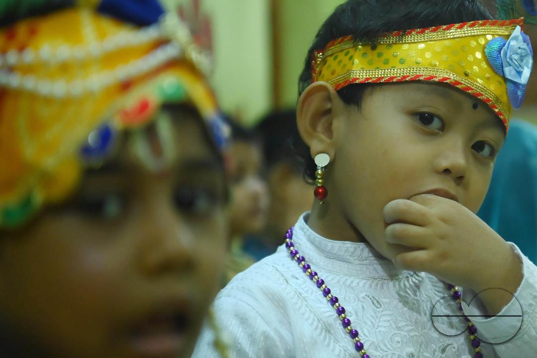 Students of the "My Chotaââ pre School dress up as Hindu deity "Krishna", on the eve of the Krishna Janmashtami Festival at Agartala