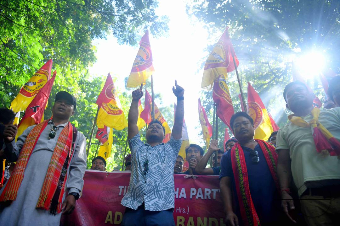 The âTipraha Indigenous Progressive Regional Alliance (TIPRA)ââ supporters raise slogans demanding a separate Greater Tipraland state for tribals, in Bermuda Ashram Para