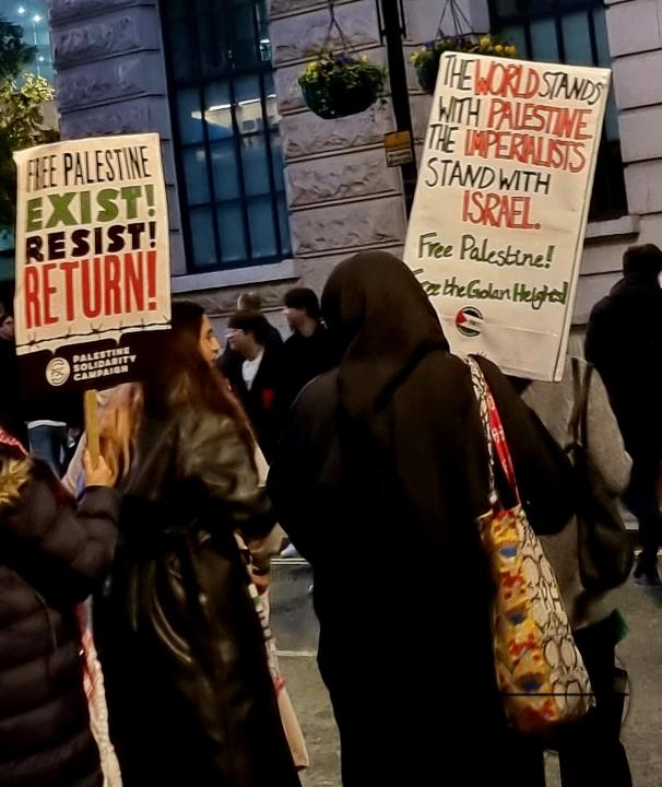 Thousands of protestors raise voices, carry placards and show their support for Palestinians, at Trafalgar Square, central London