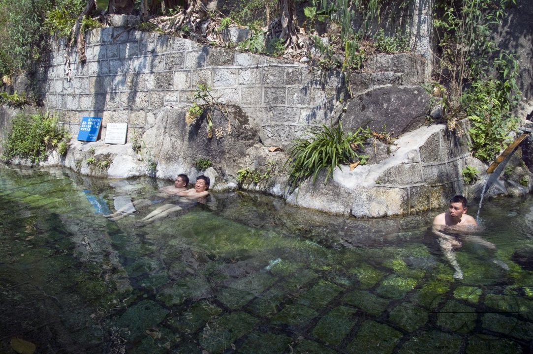 CHINA Local tourists at a spa spring in a nature reserve in Yunnan province.