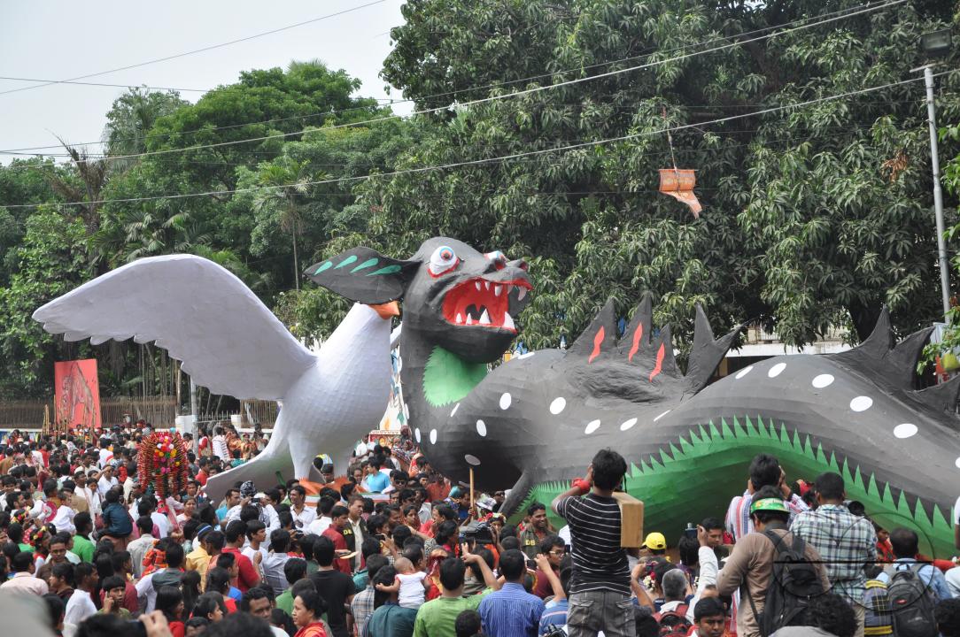 People celebrating in a colorful parade on the streets as a part of New year celebrations