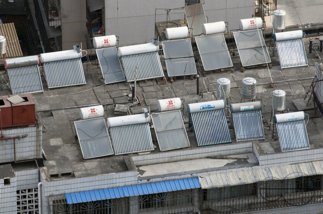 CHINA Solar panels installed on roofs of apartment buildings and offices in Kunming, Yunnan province.