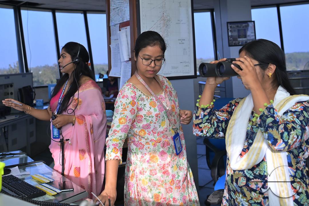 Female traffic controllers, Bipasha Hrangkhawl, Disha Chandra, and Chaya, take charge of traffic management at the Agartala airport's ATCT Tower to celebrate International Women's Day