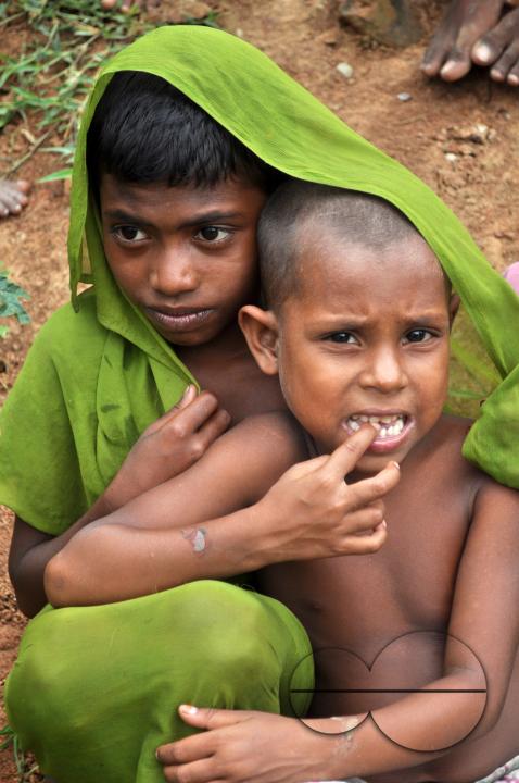 Portrait of two boys in the slums of Rayer bazar