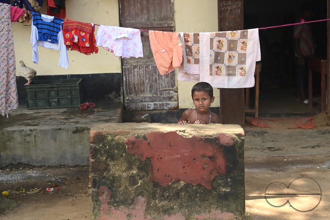 A boy at a temporary relief camp at Pratapgarh English Medium School in Agartala