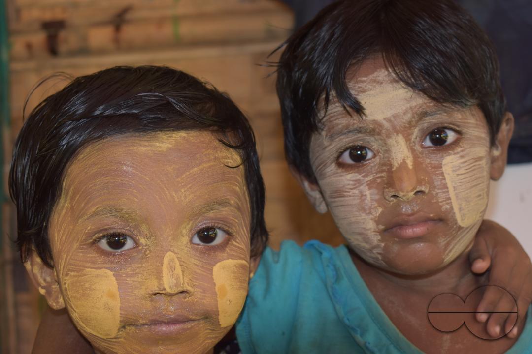 Portrait of two children dressed for a concert at the Balukhali refugee camp