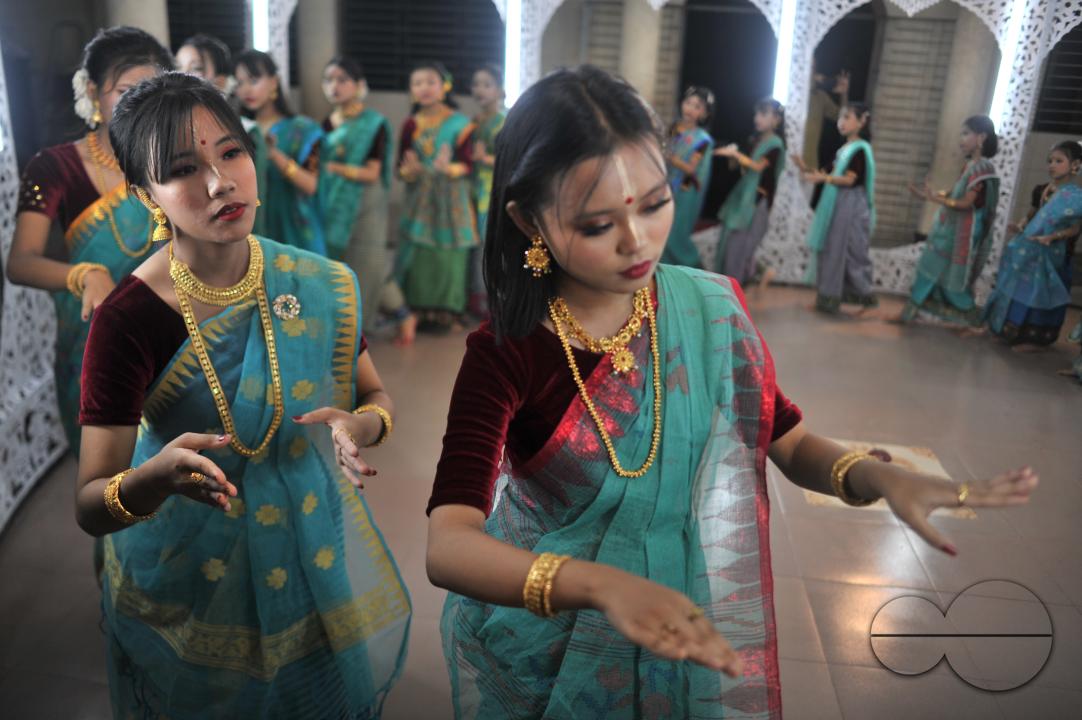 The manipuri community dancing with their traditional dresses