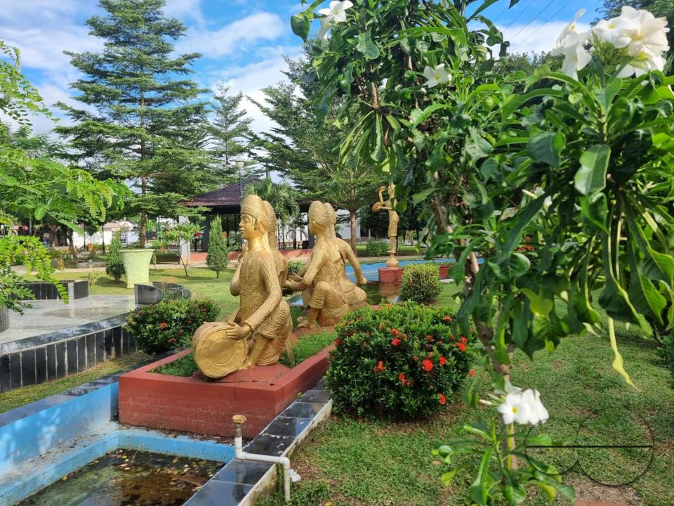 Gilded statues of local musicians decorate the garden of the Albert Ekka War Memorial at Lichu Bagan, on the outskirts of Agartala