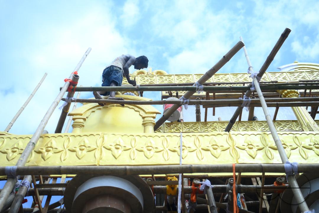 Workers are making a pandal, a temporary structure set up to usually venerate the God and Goddess, ahead of Ganesh Chaturthi festival in Agartala