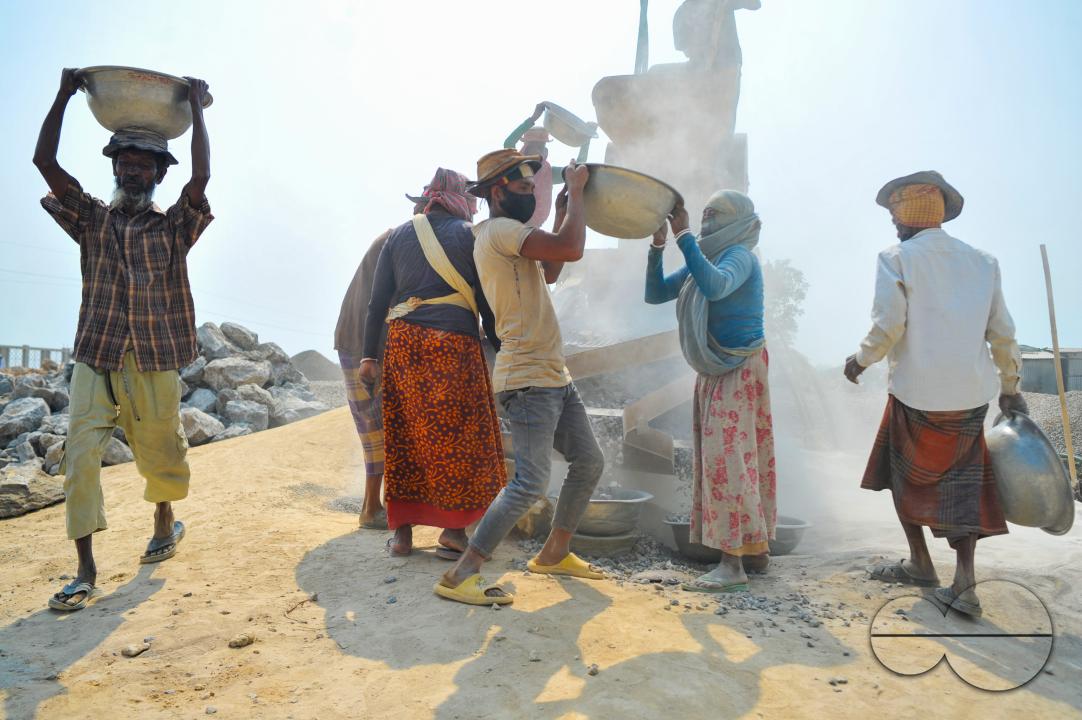 Male and female workers are breaking LC stones with a crusher machine in Bholaganj area, known as the 'Stone State' of Sylhet Companyganj Upazila