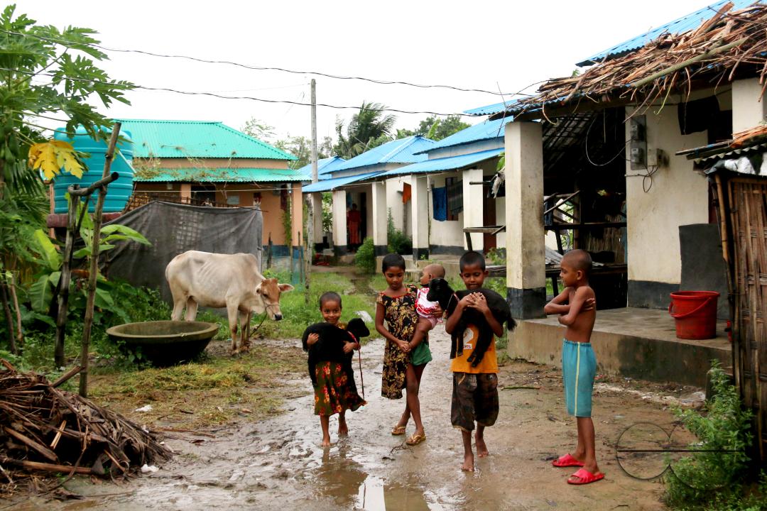 Rural Bangladeshi children happily playing in the neighborhood