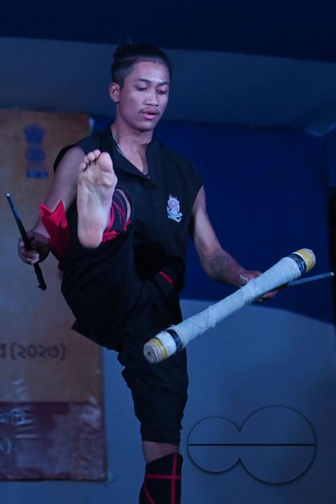 Manipuri martial arts students performing at the opening program of the 225th Raas Festival in Radha madhab Mandir at Agartala