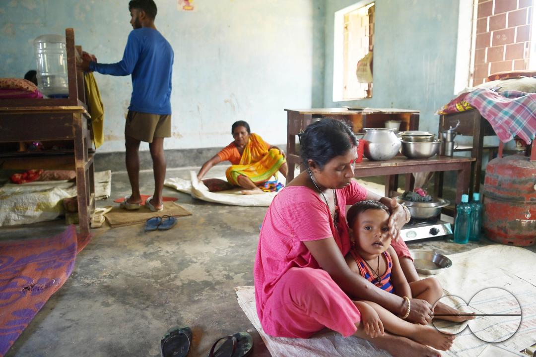 A mother with her son at a temporary relief camp at Pratapgarh English Medium School in Agartala