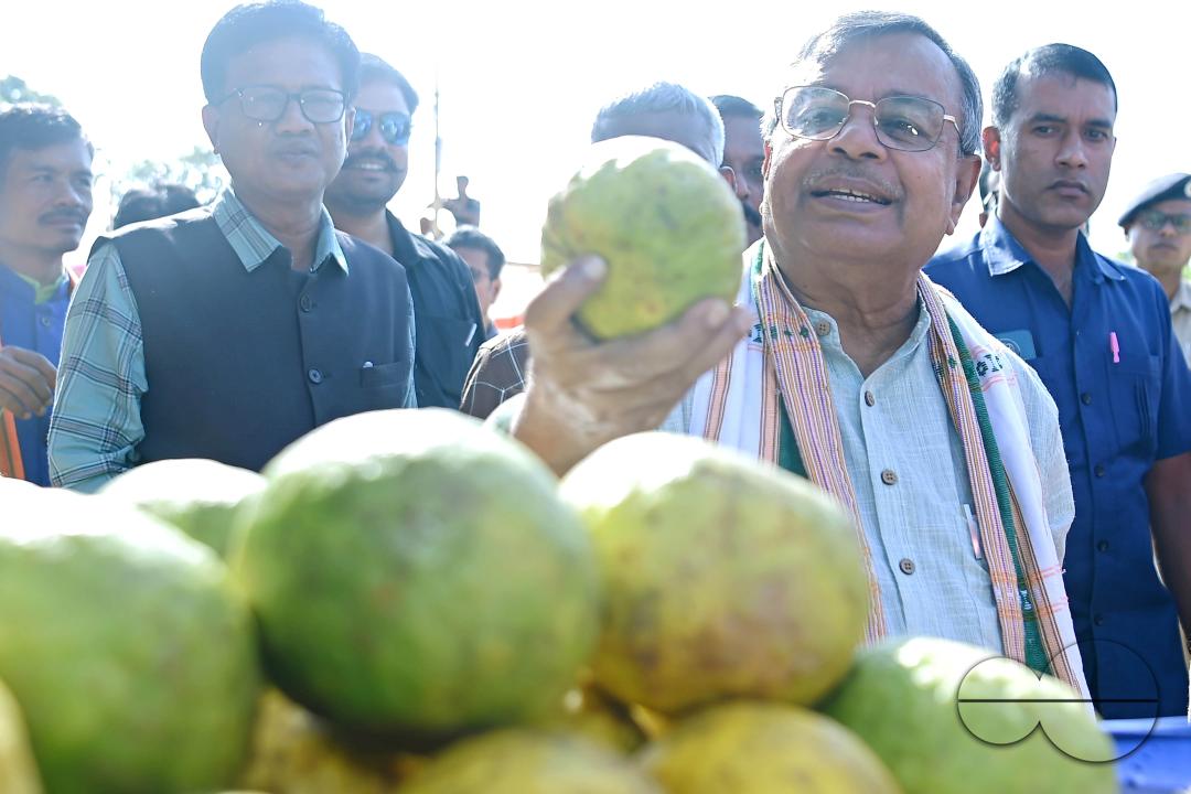 Minister for Agriculture and Farmers Welfare, Ratan Lal Nath inspects oranges during the Orange Festival in Taibaglai Village (Killa) organized by the Agriculture and Farmers Welfare of Tripura