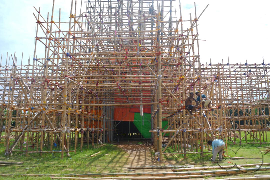 Workers are making a temporary bamboo structure, locally called "Pandal", for the upcoming Durga Puja in Agartala