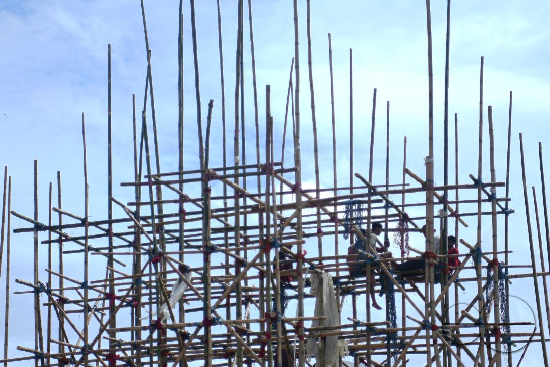 Workers are making a temporary bamboo structure, locally called "Pandal", for the upcoming Durga Puja in Agartala