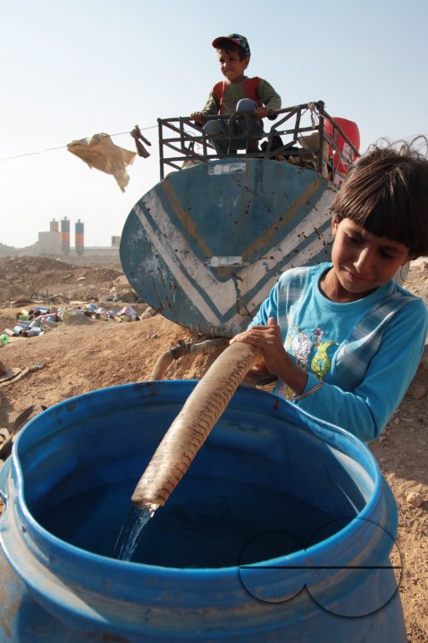 Photo story - Abu Mohammad and His family - the relationships between a poor family how they live.