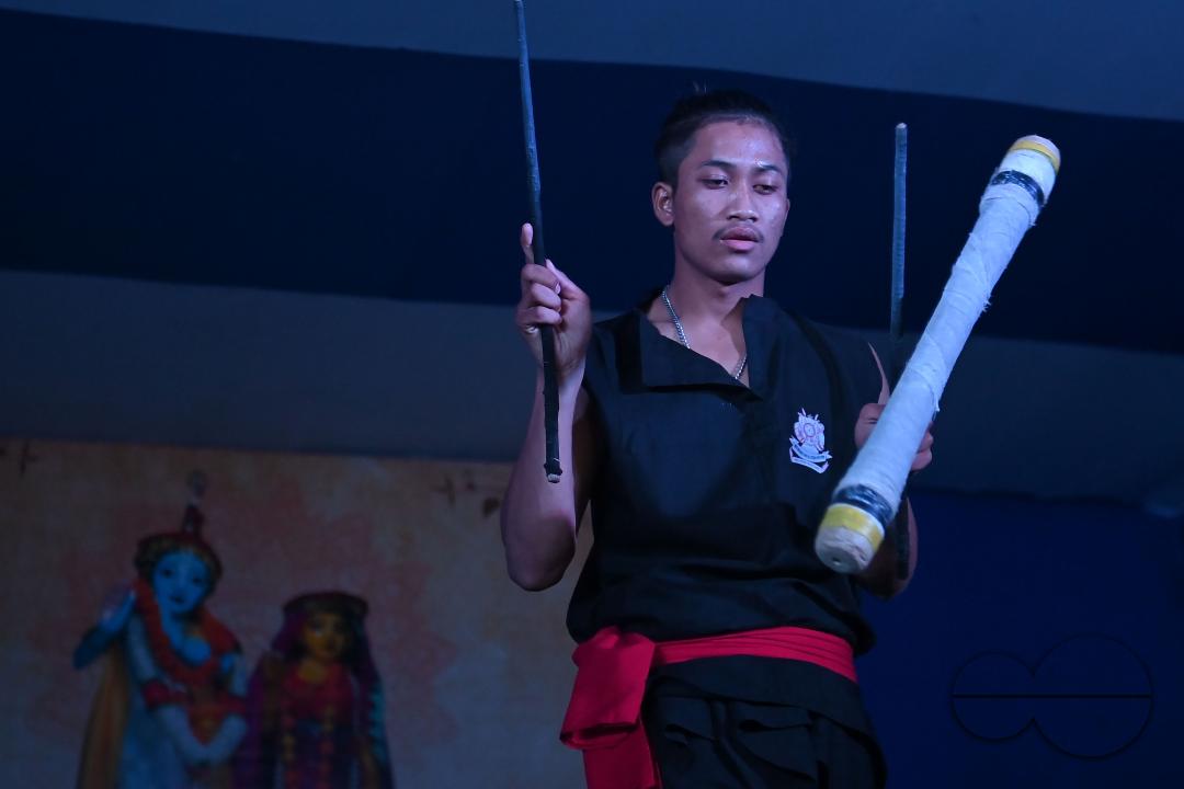 Manipuri martial arts students performing at the opening program of the 225th Raas Festival in Radha madhab Mandir at Agartala