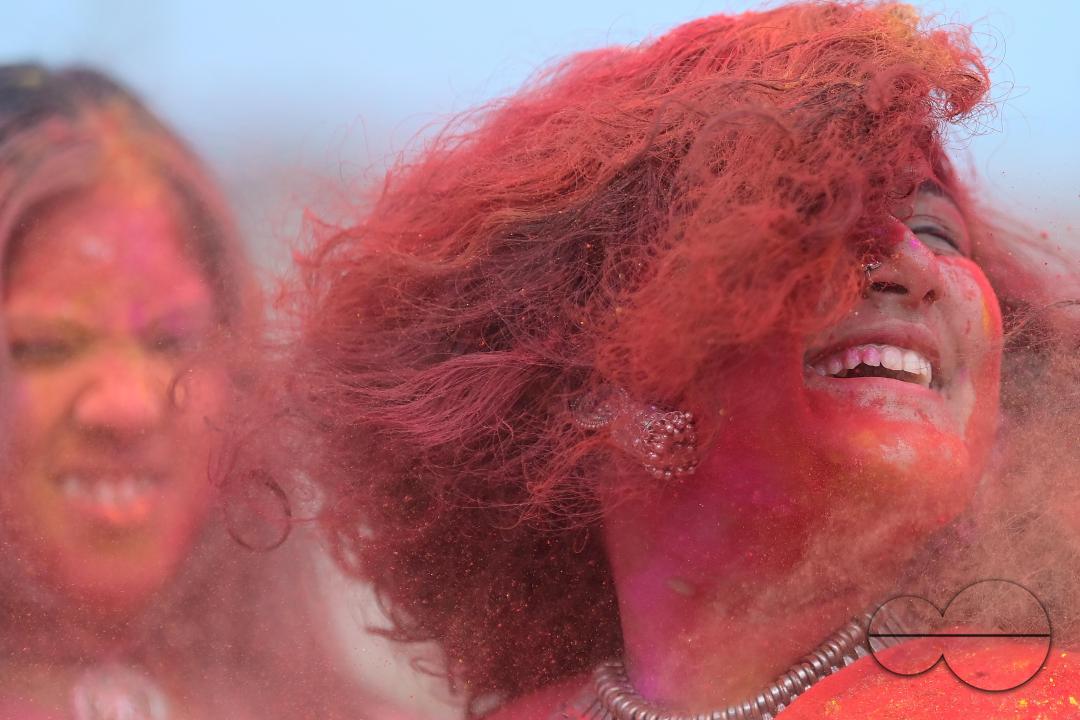 Indian girls adorned with 'Gulal' or coloured powder during the Hindu spring festival 'Holi', the festival of colour in Agartala