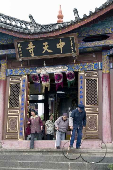 CHINA Elderly people leaving a temple in a village in Yunnan province.