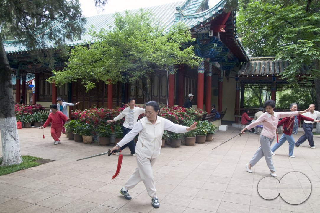 CHINA Elderly people practicing Tai Chi and other martial arts in a park in Kunming, Yunnan province..