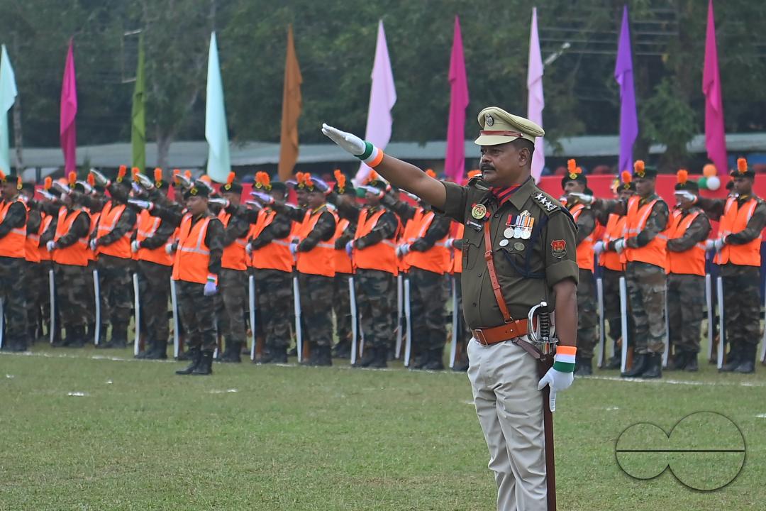 Troopers from the NDRF, Home Guards and Civil Defence take oath on the 61st All India Civil Defence and Home guards raising day at the police parade ground in Agartala
