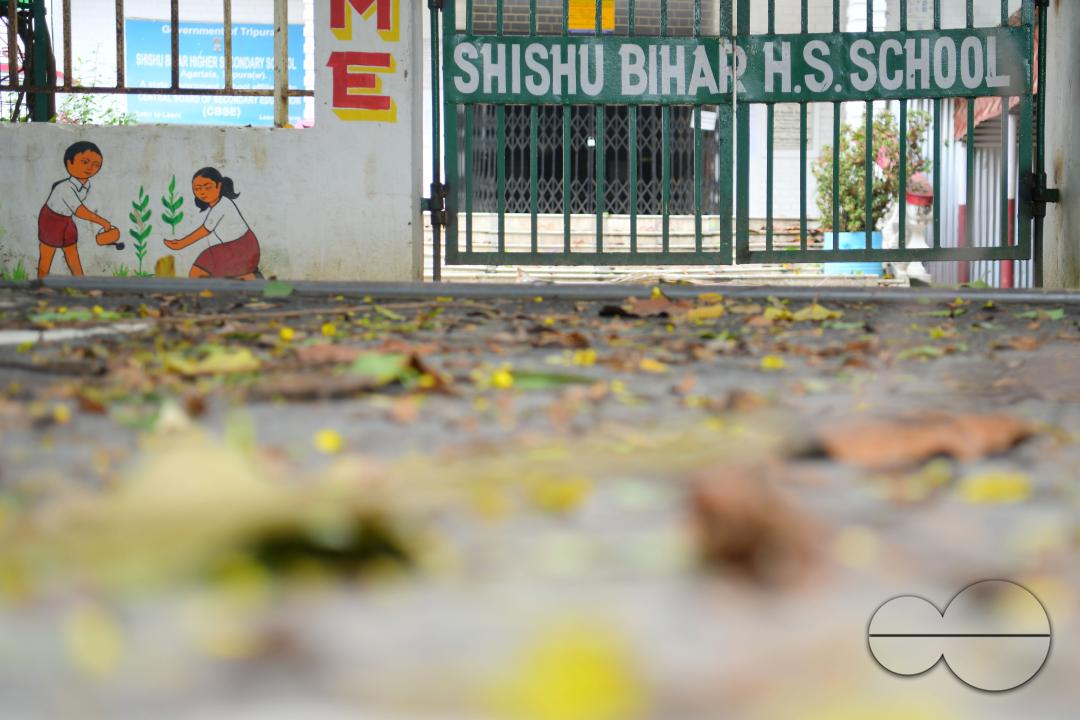 A locked gate of a government school during cyclone MidhiliÂ in Agartala