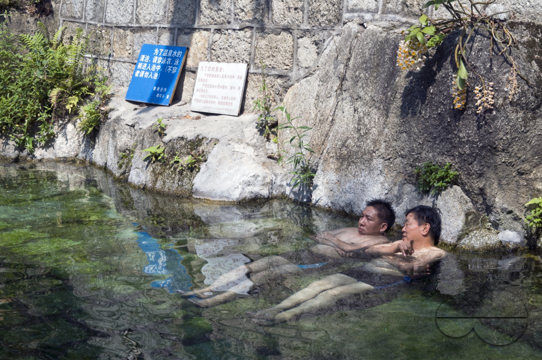 CHINA Local tourists at a spa spring in a nature reserve in Yunnan province.