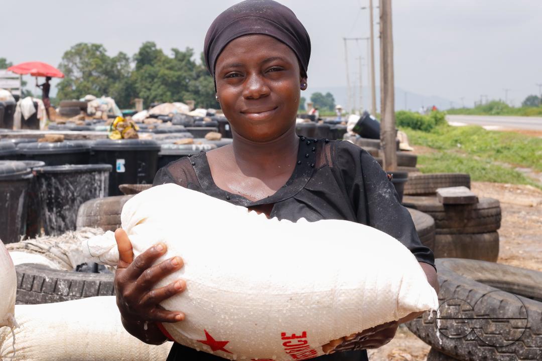 Females in Abuja are struggling and making strides in a local cassava processing factory under difficult conditions to produce flour as they wash out chaff from fermented cassava