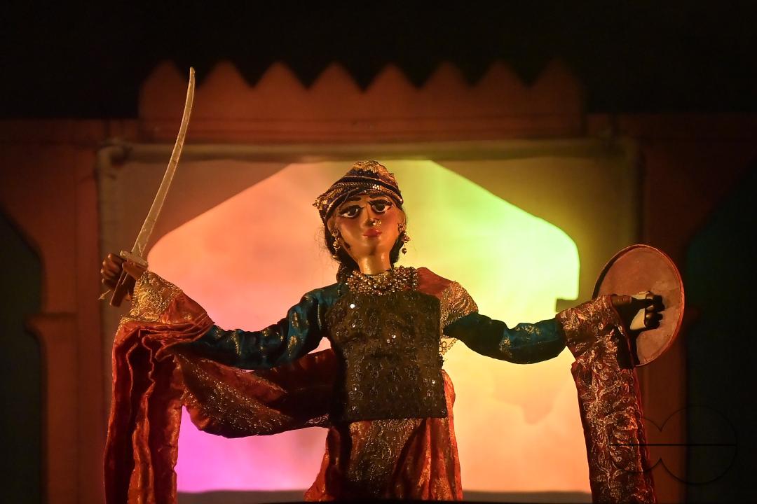 Puppeteers perform with puppets during the Tripura International Puppet Utsav 2024 organized by Tripura Puppet Theatre to celebrate 50 years of puppetry excellence