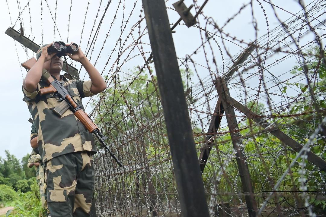 Security personals of the Border Security Force (BSF) providing tight security and patrolling the India- Bangladesh fencing in Nischinta Pur area, in precaution to the ongoing anti-quota protests in neighbouring country Bangladesh