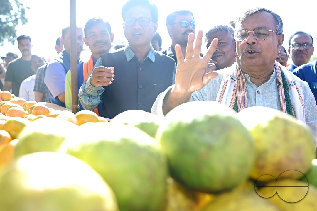 Minister for Agriculture and Farmers Welfare, Ratan Lal Nath inspects oranges during the Orange Festival in Taibaglai Village (Killa) organized by the Agriculture and Farmers Welfare of Tripura
