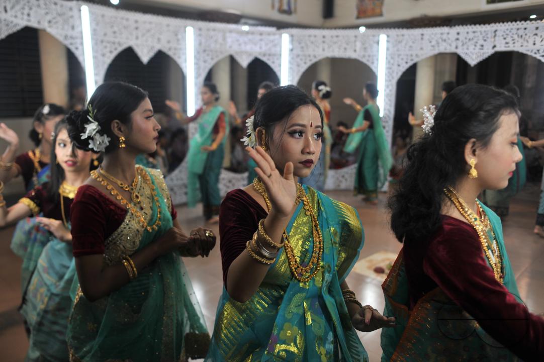 The manipuri community dancing with their traditional dresses